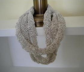Multistrand necklace knit with linen mix ivory colored yarn.